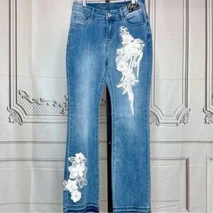 Flared Leg Ethyl Denim Jeans with White Floral Embellishment.